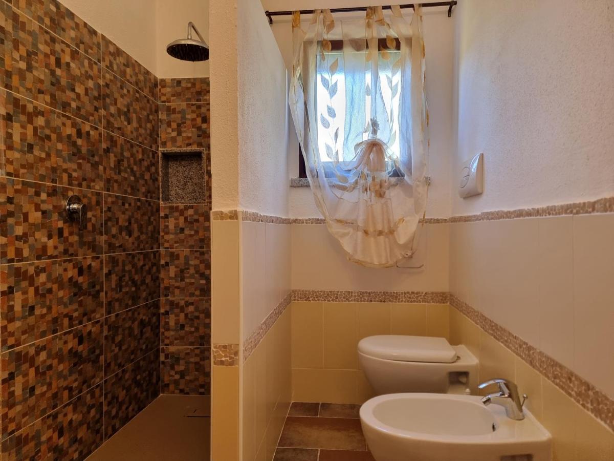 Le Residenze Di Baia Sant'Anna Villa Tanaunella Exteriör bild